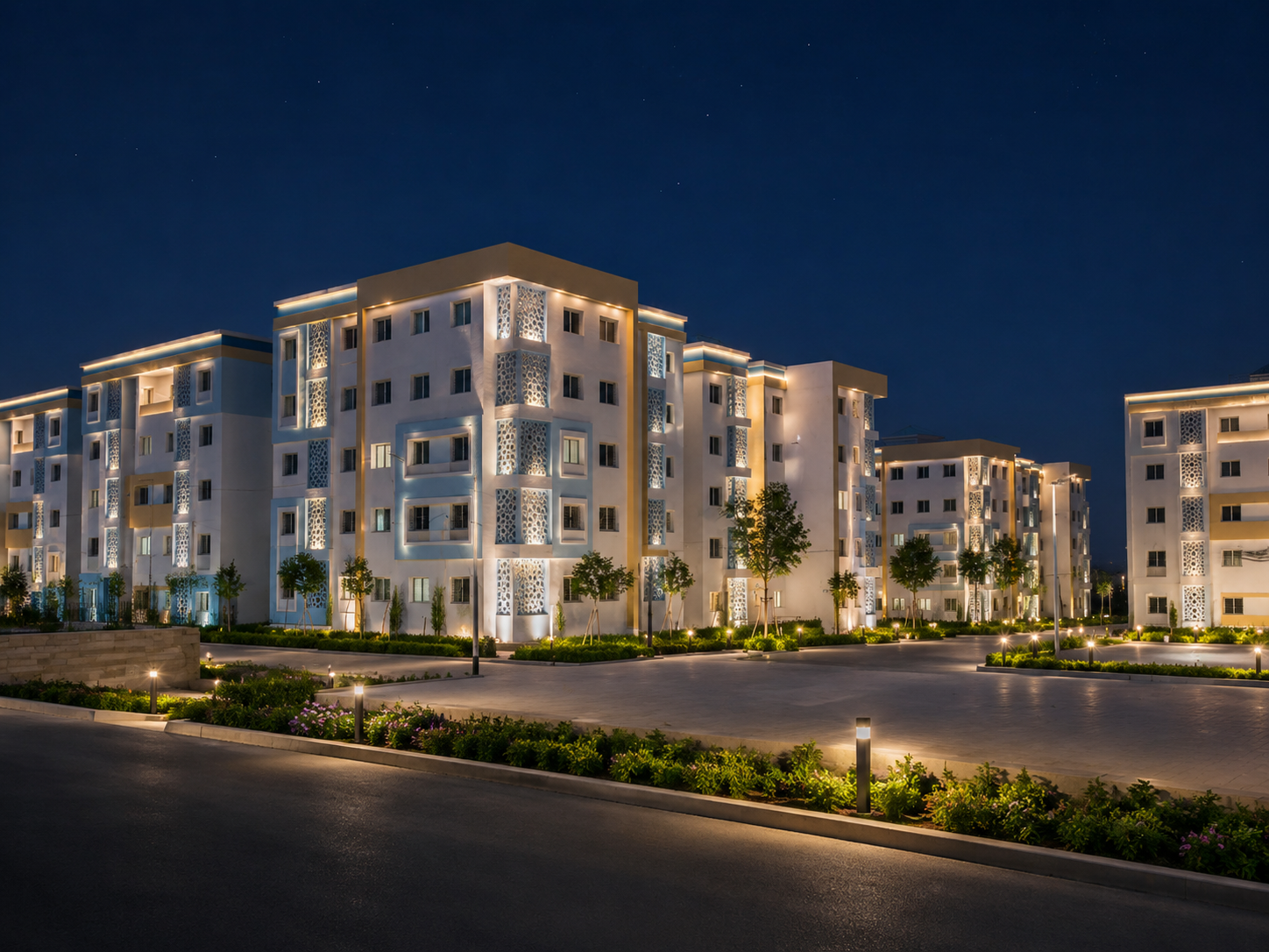Les Lauriers TR2 — illuminated residential blocks at night